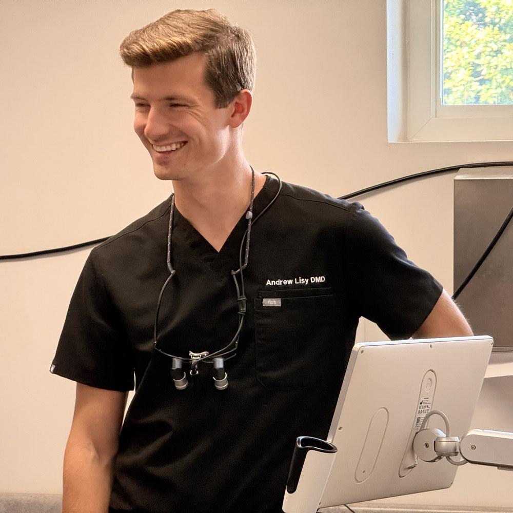 Dr. Andrew Lisy smiling in the operatory